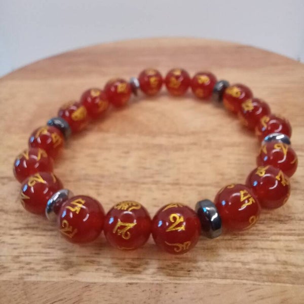 Bracelet Cornaline - gravé mantra Om & Hématite 10 mm