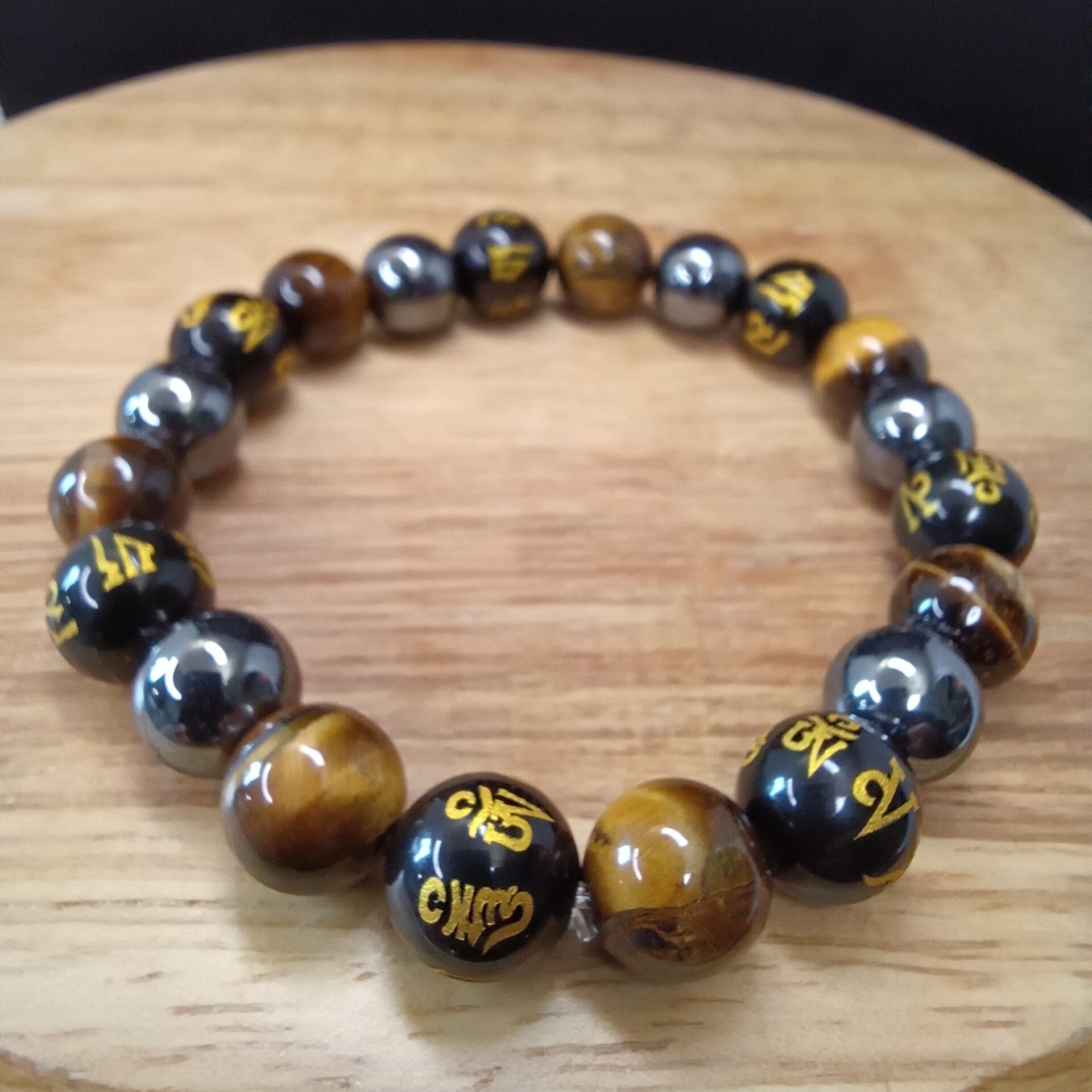 Bracelet Œil du Tigre / Hématite / Obsidienne Œil Céleste gravée mantra Om 10 mm