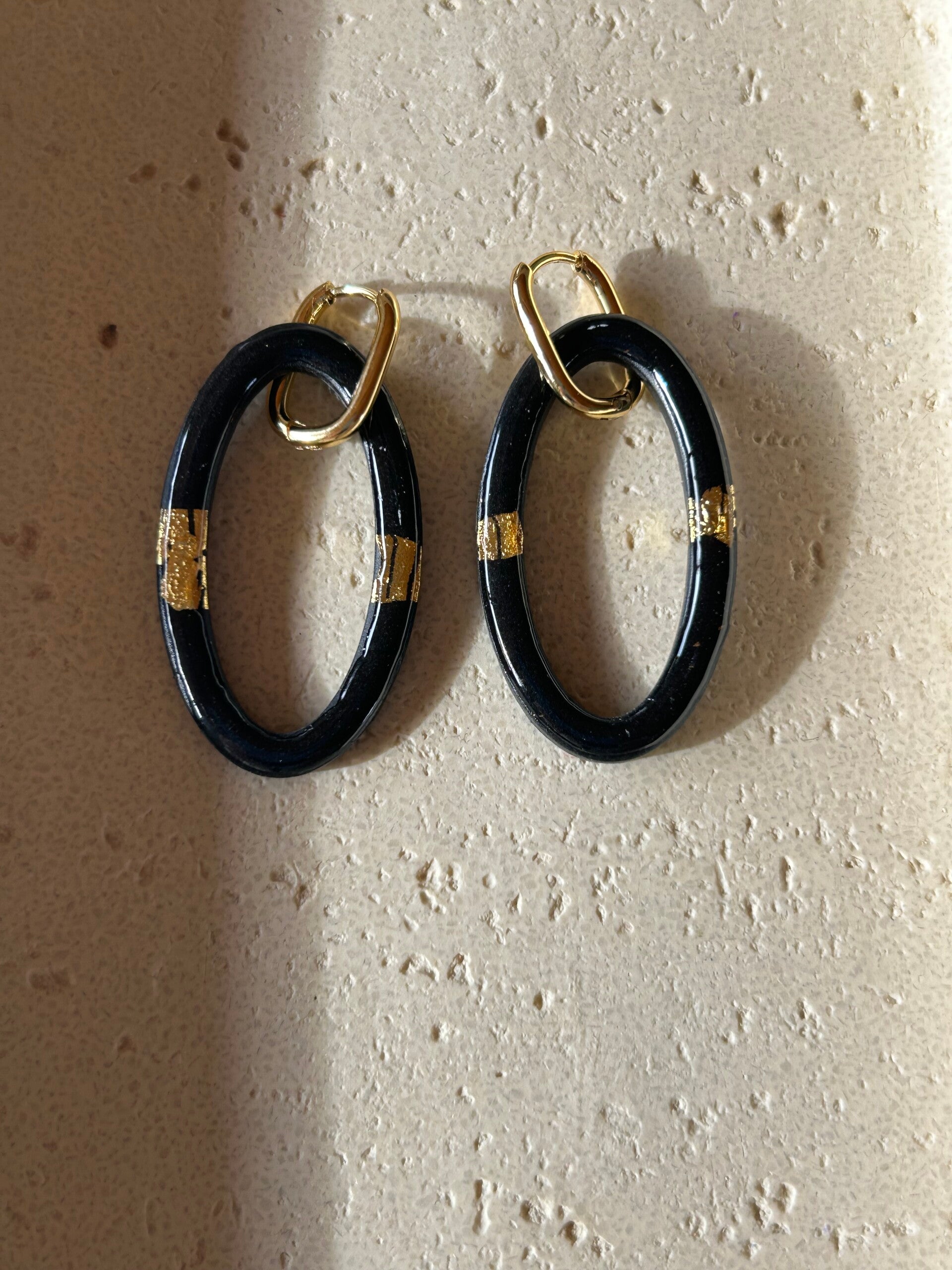 Zwart/goud shiny 1