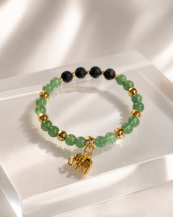 Green Aventurine with gold accents and an elephant charm.