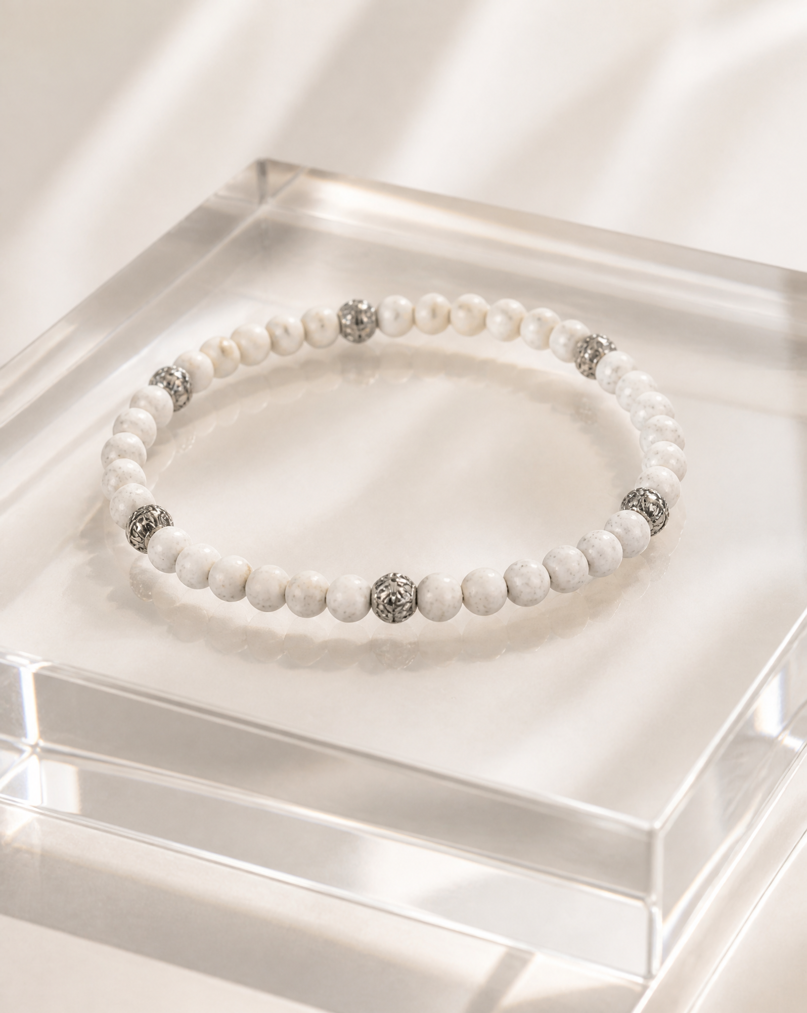 4mm White Lava beads with silver accent beads