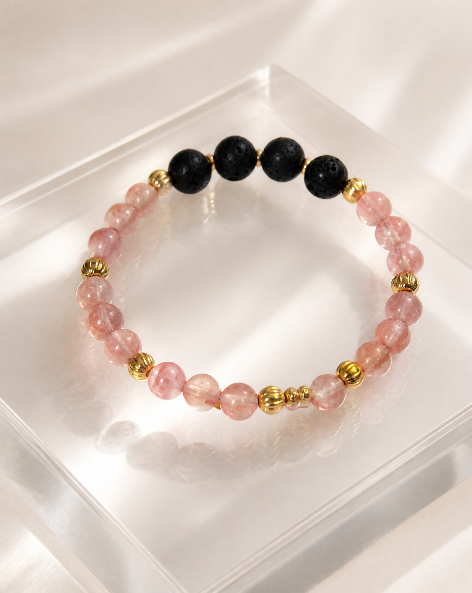 Black lava beads with 6 mm strawberry quartz, beads beaded bagel