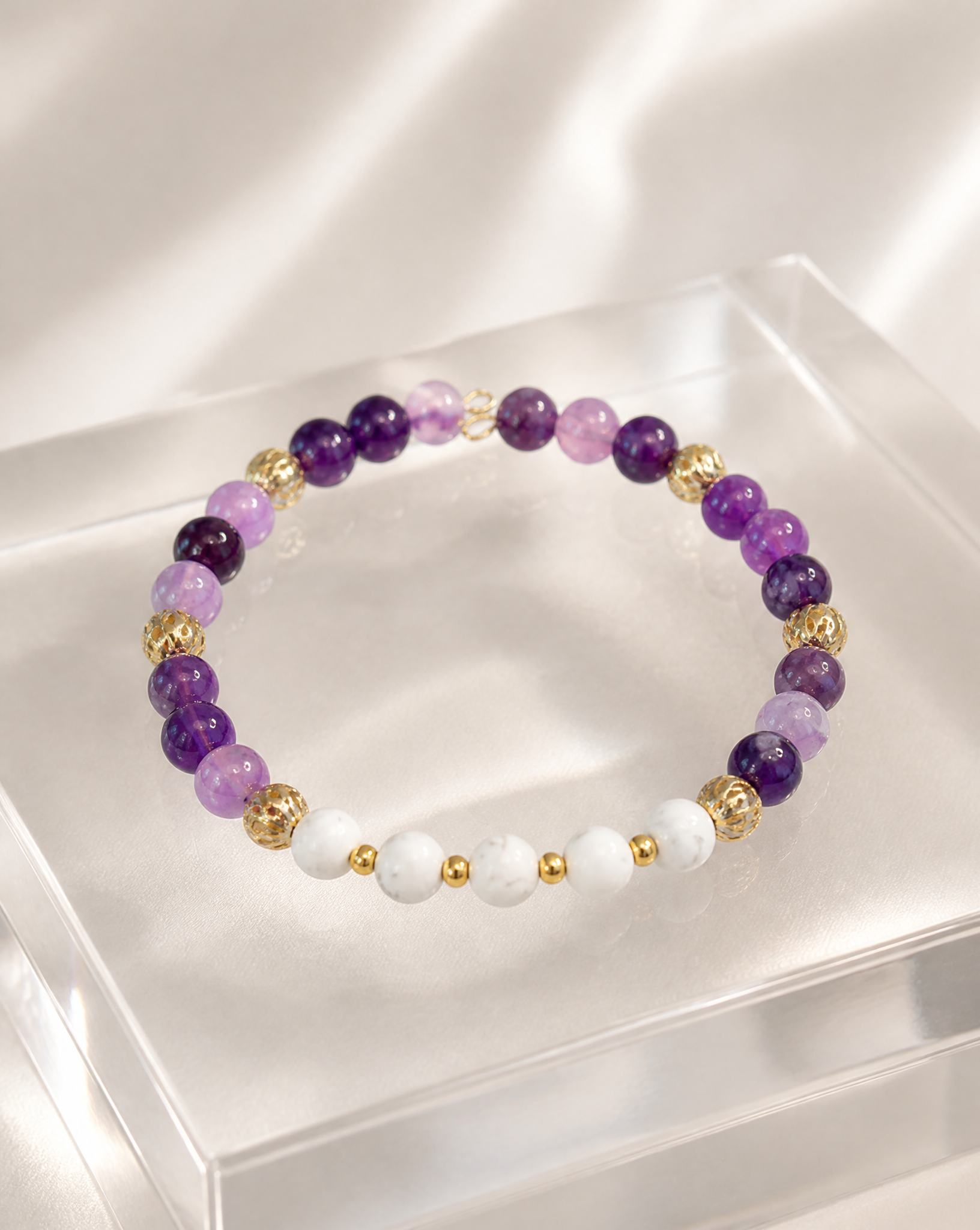 6mm White Lava and Amethyst beads with Gold Accents Bracelet