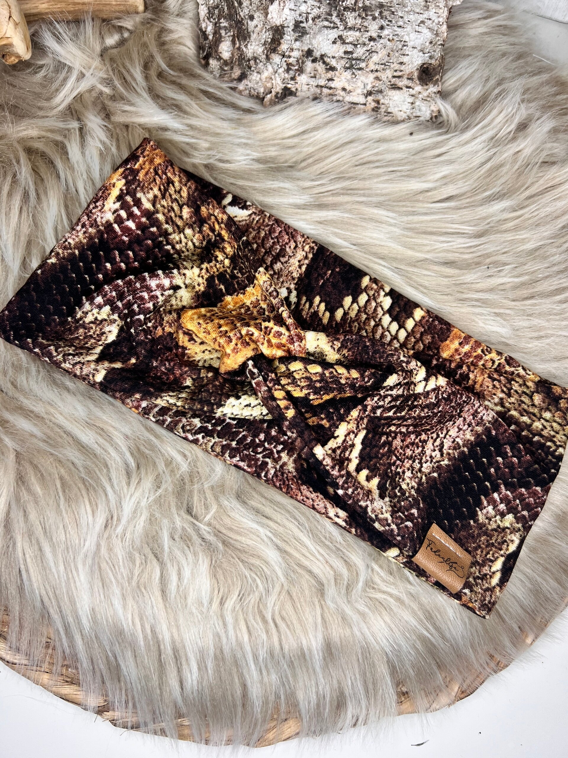 Knotenband schlangenlook