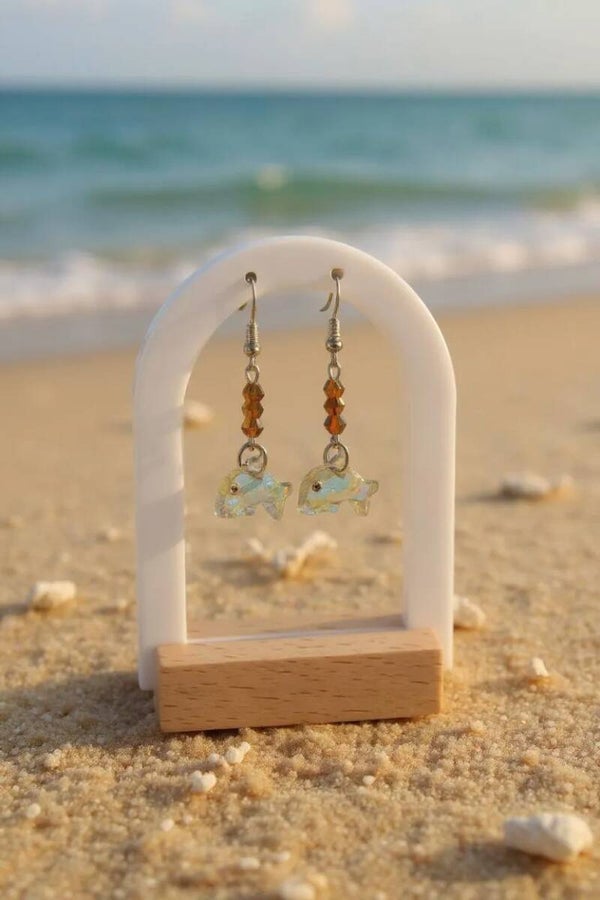 Boucles d'oreilles pendantes "Dauphins", composées de perles en cristal. Acier inoxydable