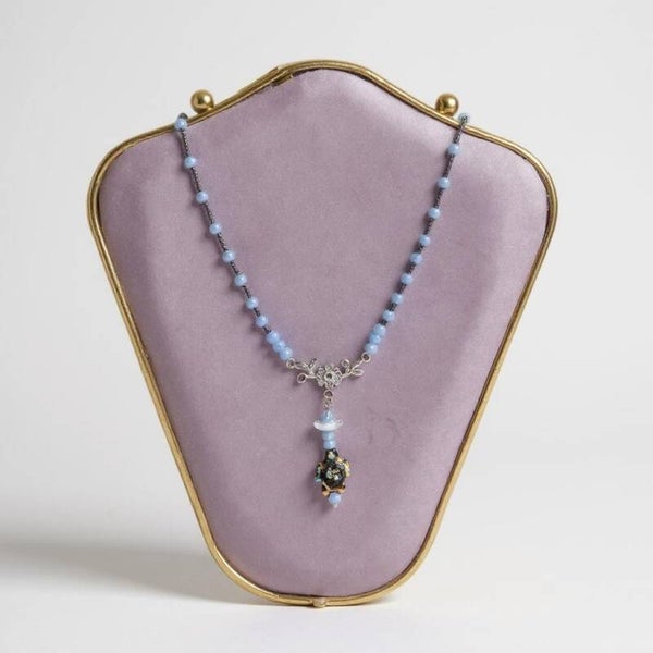 Collier 46 cm + extension "Tortue" composé de perles oeil de chat, verre et rocaille. Acier inoxydable