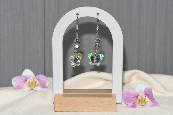 Boucles d'oreilles pendantes "Papillons" composées de perles en cristal. Acier inoxydable