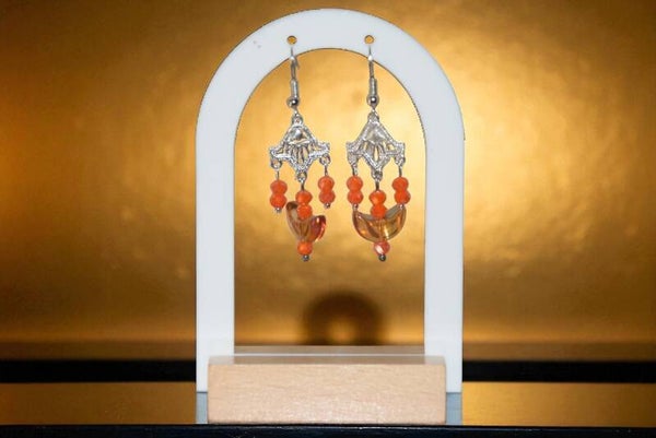 Boucles d'oreilles pendantes "Lunes" composées de perles en cristal. Acier inoxydable