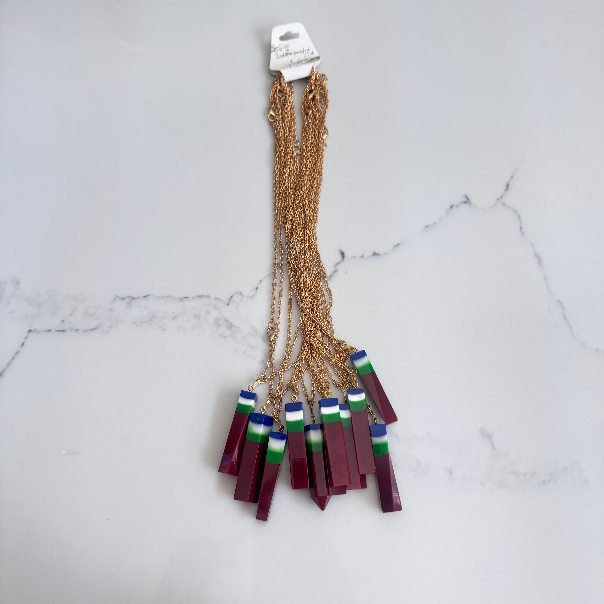 Maluku epoxy ketting goud