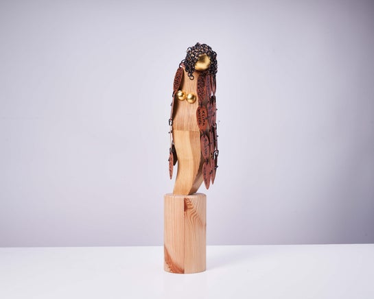 Kleine houten sculptuur Sad