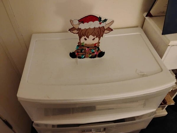 christmas cow on stand