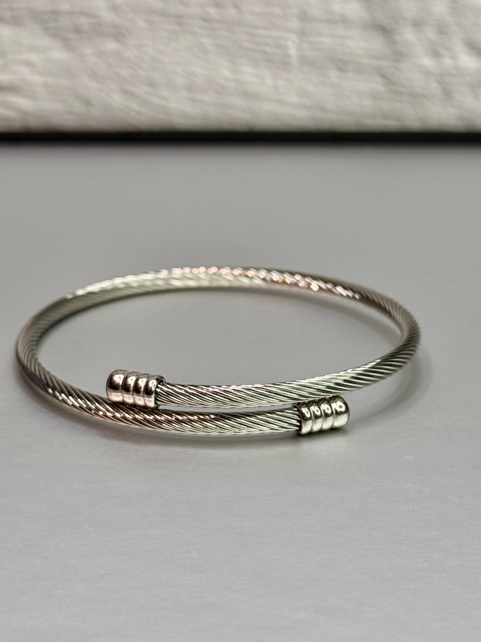 Twisted golden Bangle