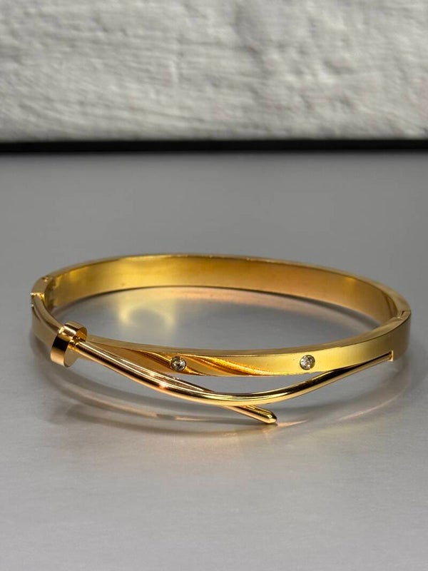 Twisted golden Nail Bangle