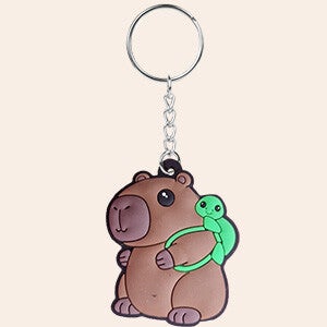 Capybara sleutelhanger met rugzakje