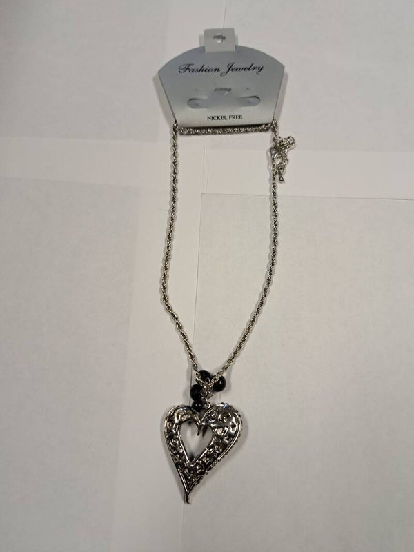 Collier en acier + pendentif coeur