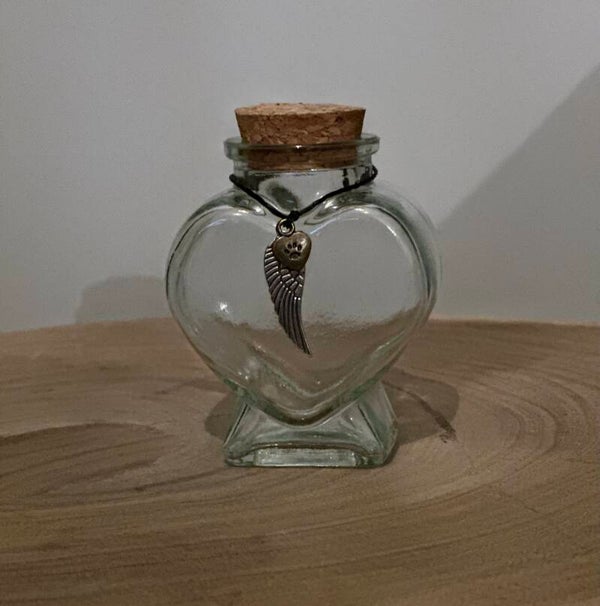 Glazen bewaarpotje voor het haar van de kat