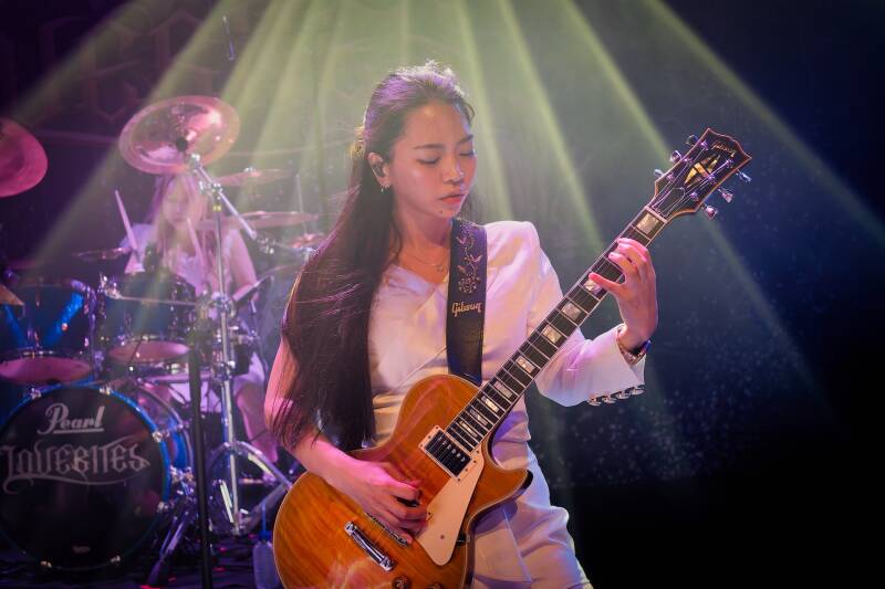 Japanese guitarist Miyako slaying her Gibson Les Paul during a gig in the Hall of Fame, Tilburg, The Netherlands