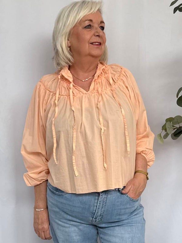Blouse: Strikjes Koraal