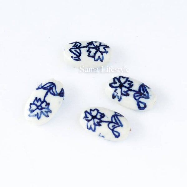 Delfs blauw - bloemen kralen 18x10mm | per 4 stuks