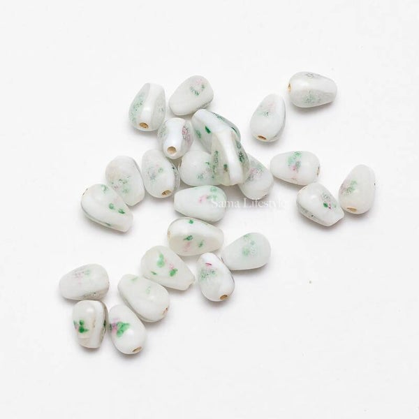 Glas - Indiase glas kralen wit met werkje 12x8mm | per 24 stuks