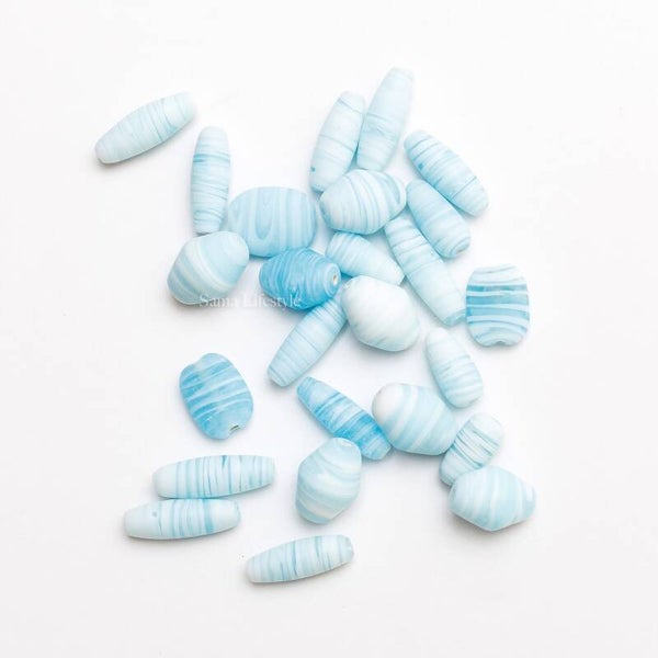 Indiase glas kralen - mix licht blauw 70 gram
