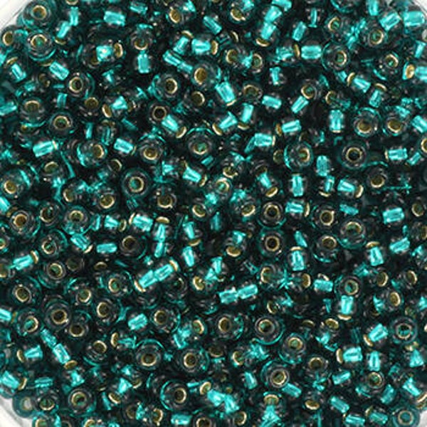 Miyuki rocailles 11/0 - Silverlined transparant dark teal | per 5 gram