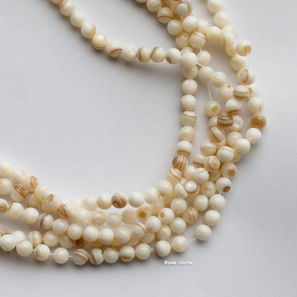Schelp - creme bruin ronde schelp kralen 6mm | per streng