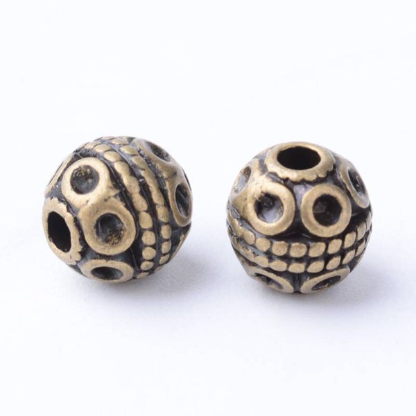 Metaal - rond met motief antique bronze | per 10 stuks