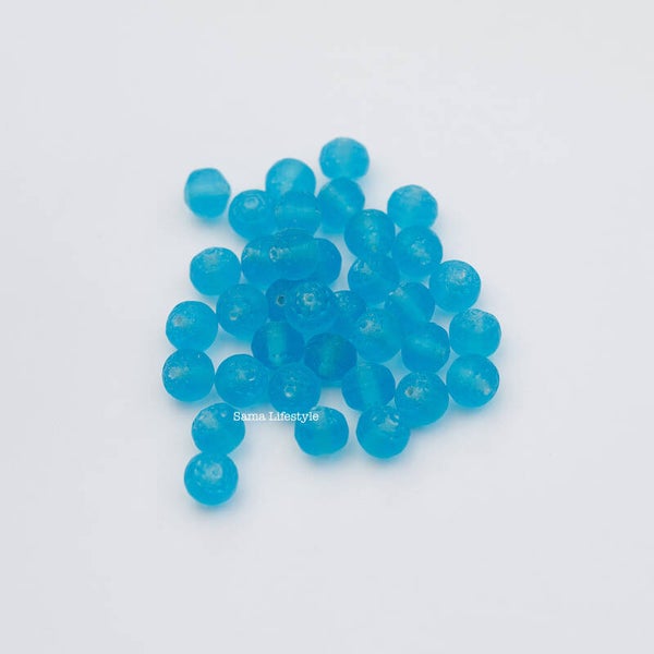 Tsjechisch glas - mat blauwe semi ronde kralen 8,5mm | per 25 gram