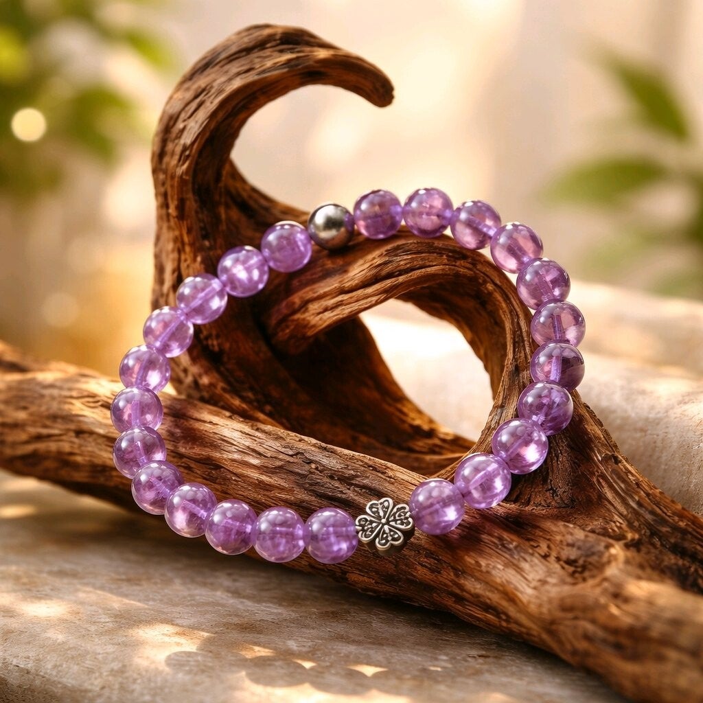 Bracelet Améthyste. Fil élastique & trèfle en hématite. 6 mm