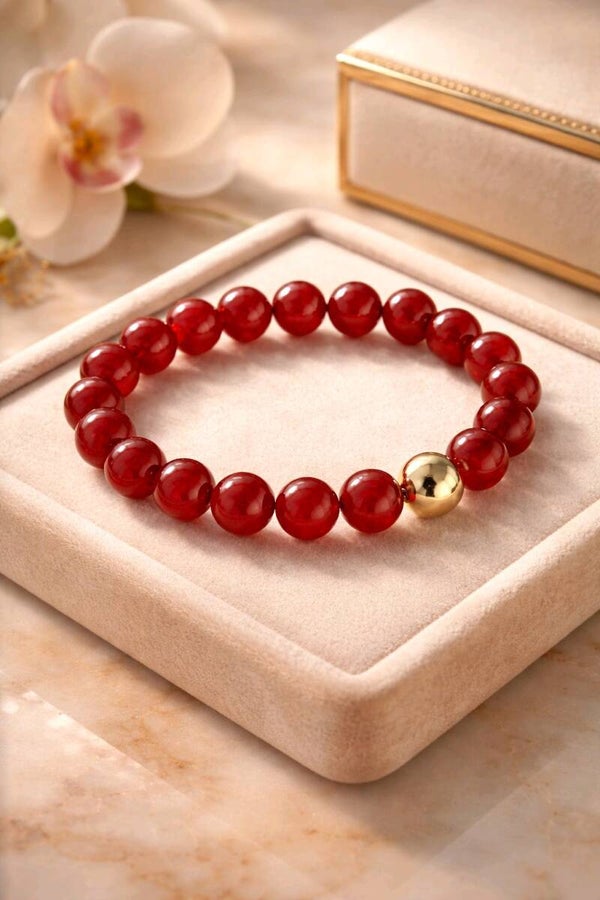 Bracelet Cornaline. Perle en acier. Fil élastique perles 8 mm