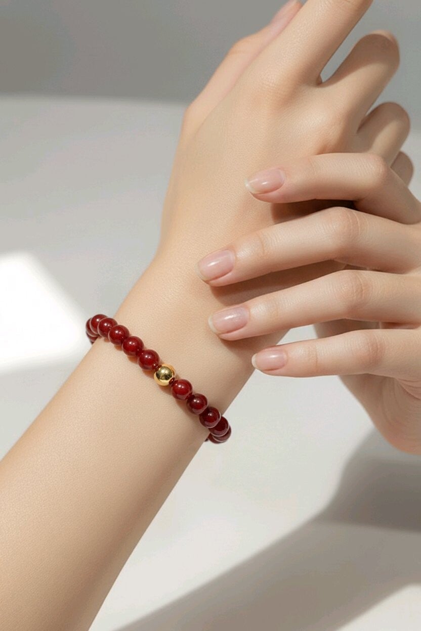 Bracelet Cornaline. Perle en acier. Fil élastique perles 8 mm