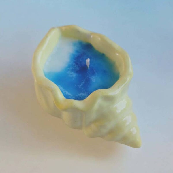Ocean shell vessel candle