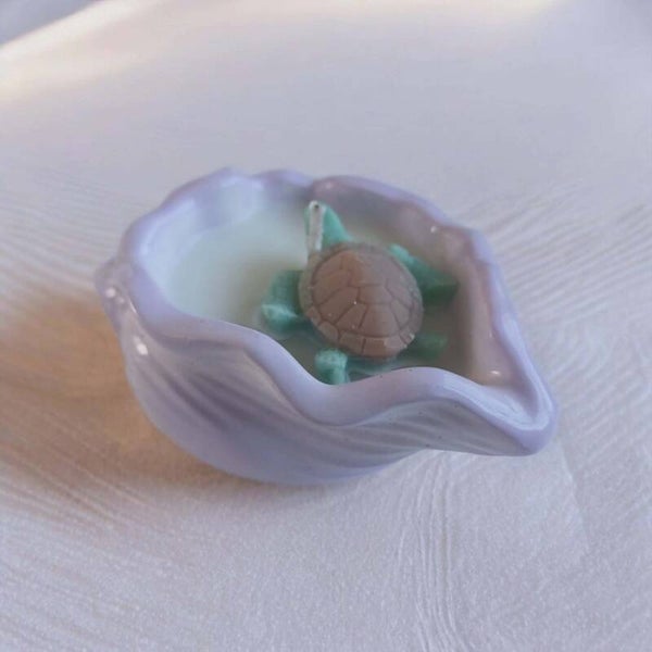 Exotic escape shell vessel candle