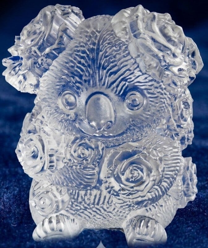 Dekorative Harz-Figur „Koala mit Rosen“