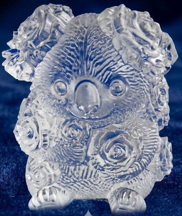 Dekorative Harz-Figur „Koala mit Rosen“