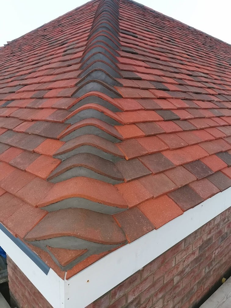 roofing job photo (site provides no caption)