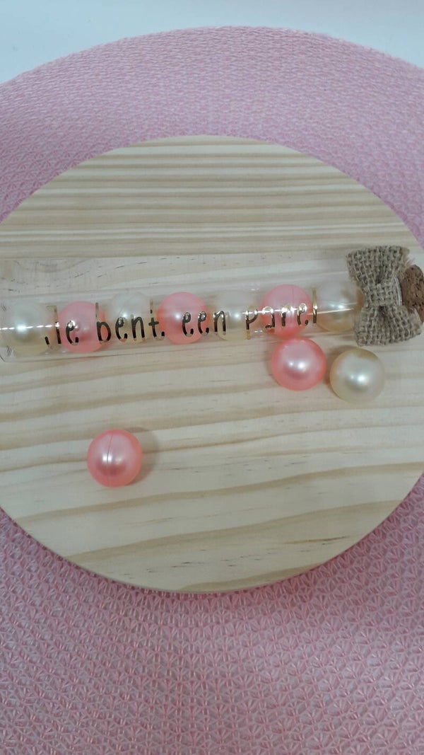 Glazen buisje met badparels