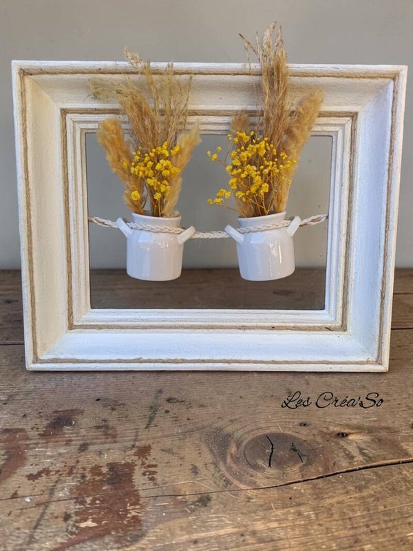 Cadre avec pots et fleurs