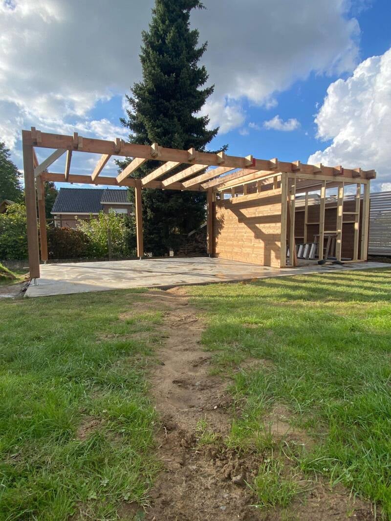 Tuinhuis op maat met zithoek