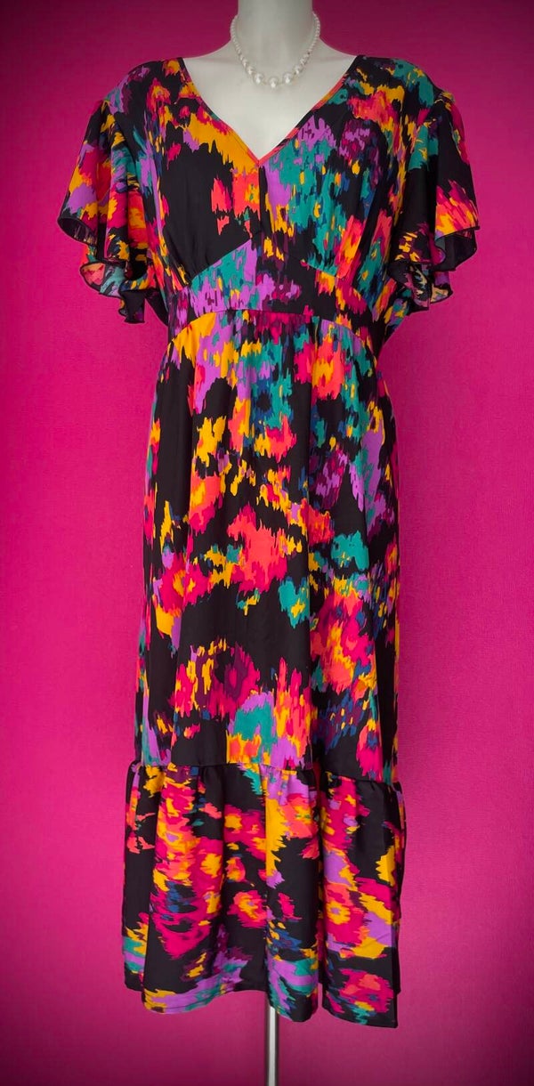 Robe Longue à Motifs – Élégance et Raffinement