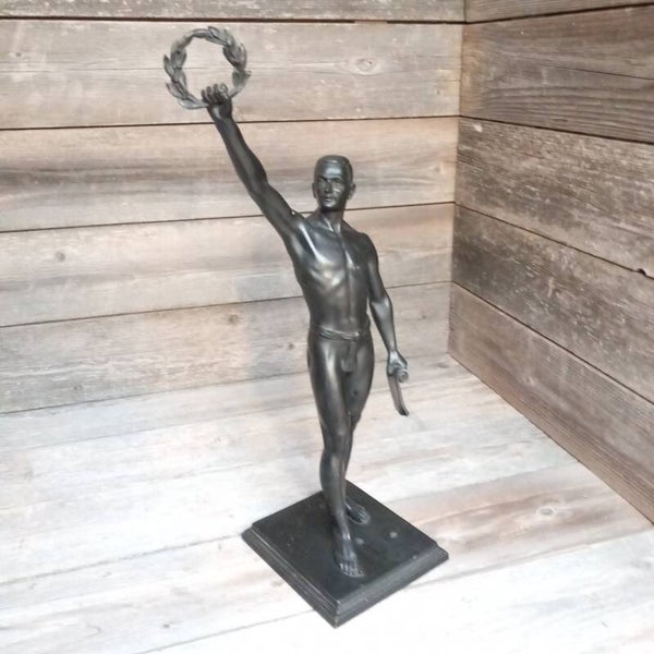 Gegoten verbronsd beeld, 'de winnaar".