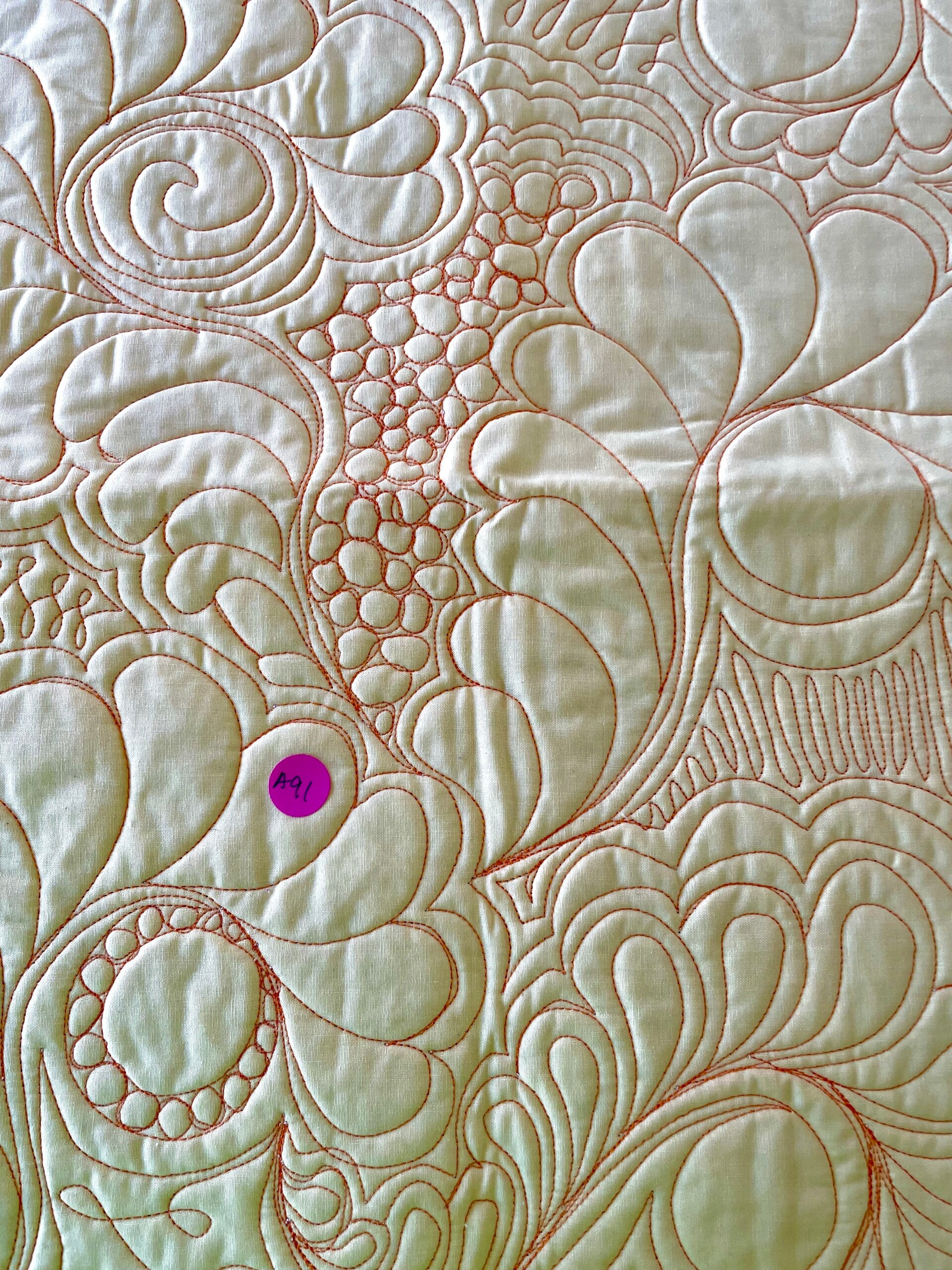 Pale Yellow Solid Fabric with Pink Quilting Design Mat