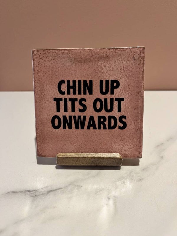 Tegel 'Chin up tits out onwards'