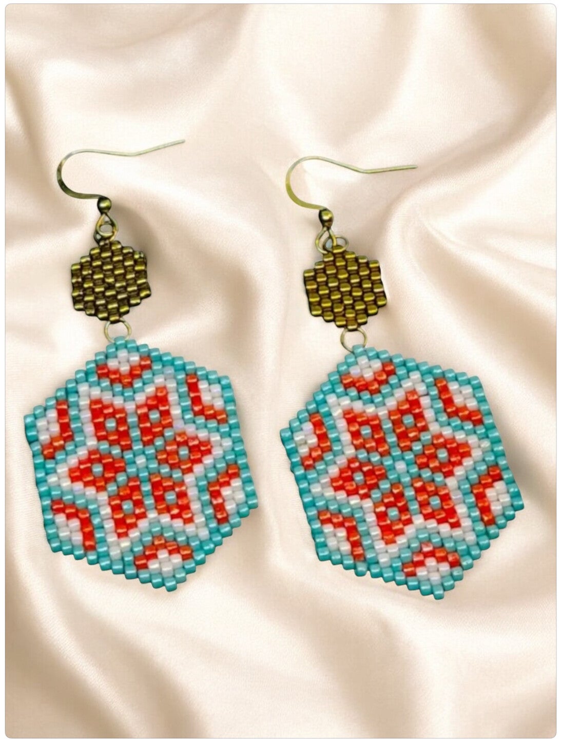 Statement oorbellen met ster design turquoise oranje