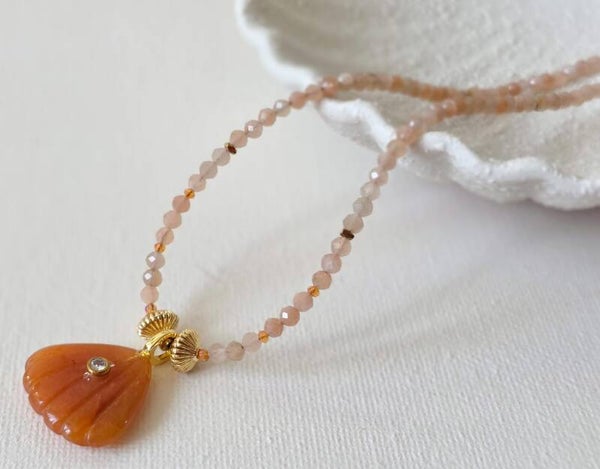 Collier coquillage de soleil