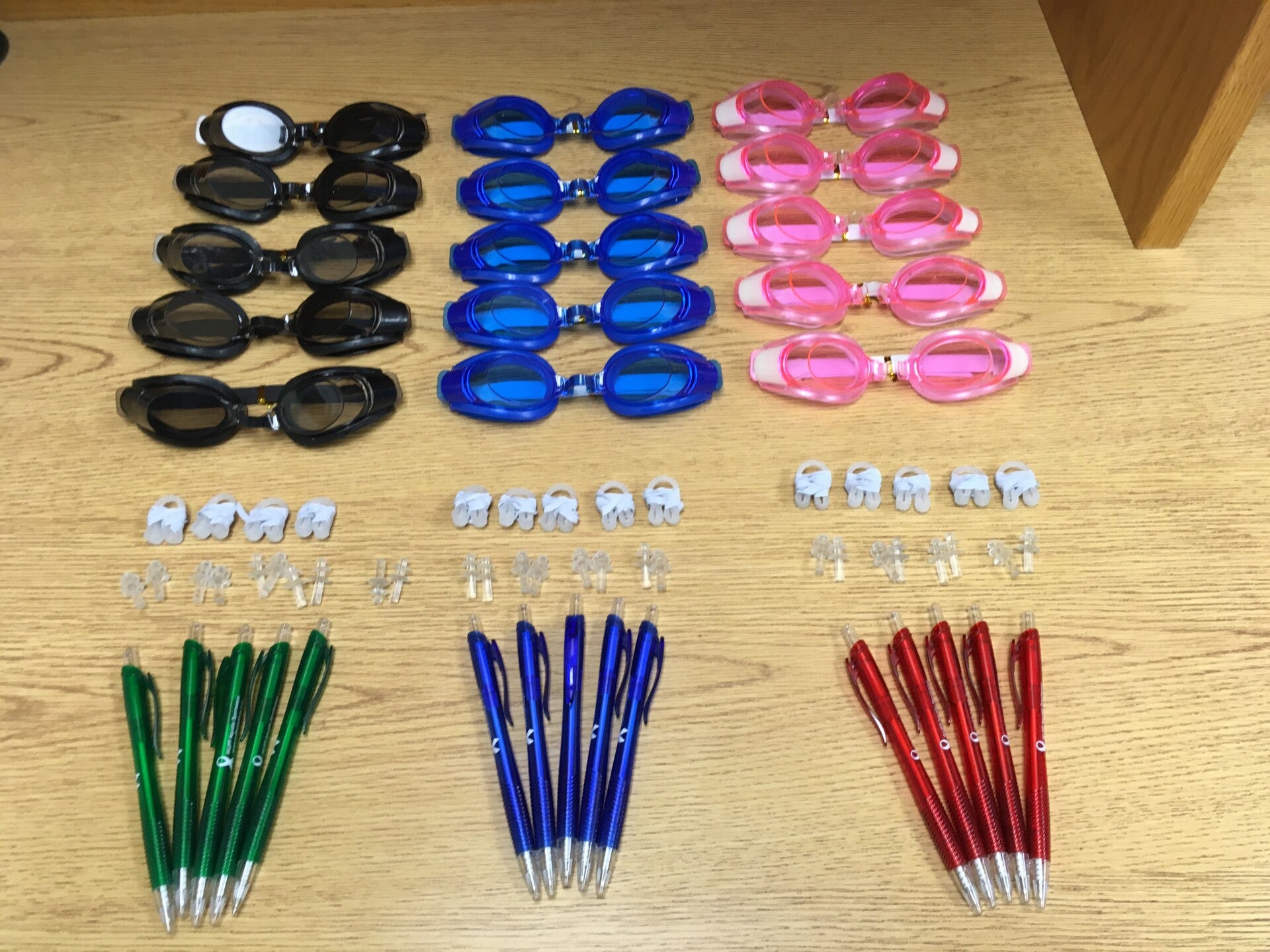 Wuff, Goggles, Pens, Nose Rings & Ear Plugs.