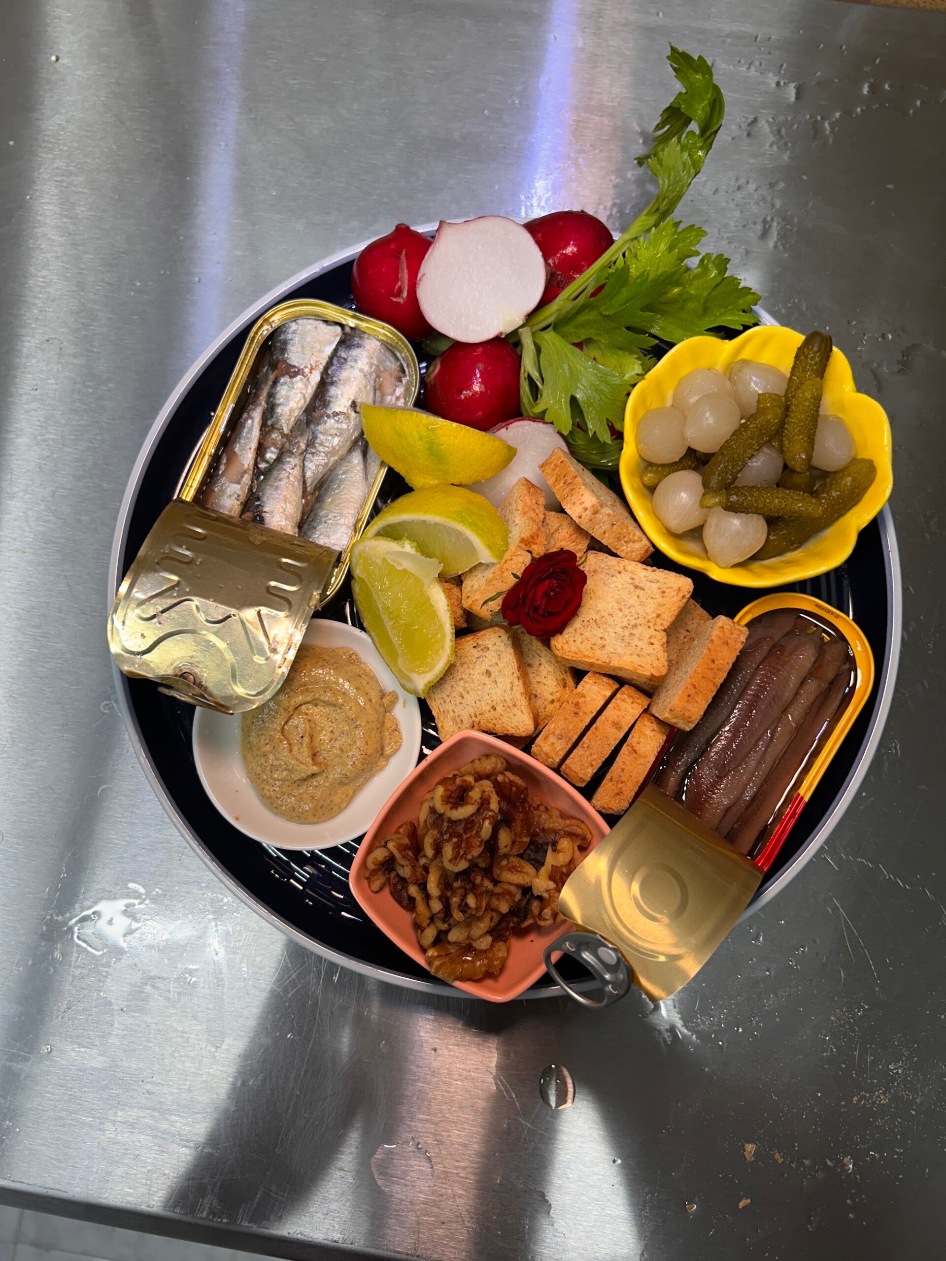 Tabla de conservas de la costa para catering de eventos corporativos