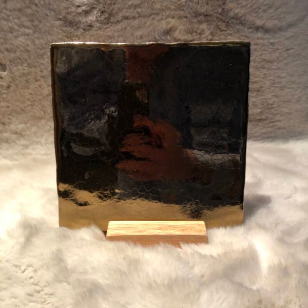 Tegeltje goud