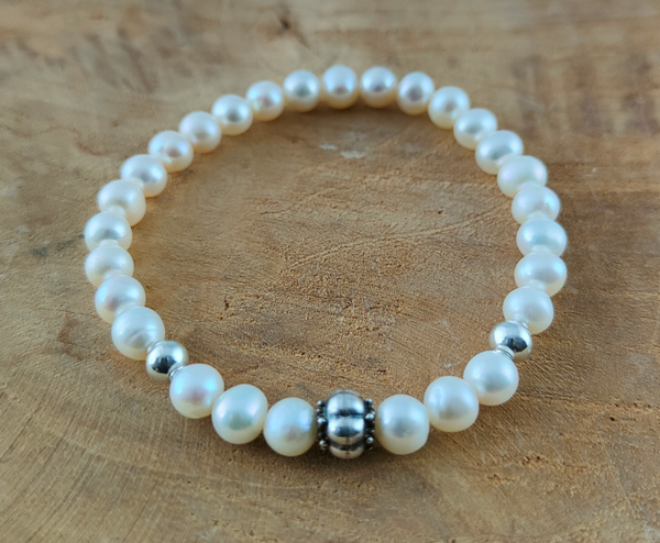 Parel Armband 6 mm met een hand bewerkte echt 925 zilveren kraal